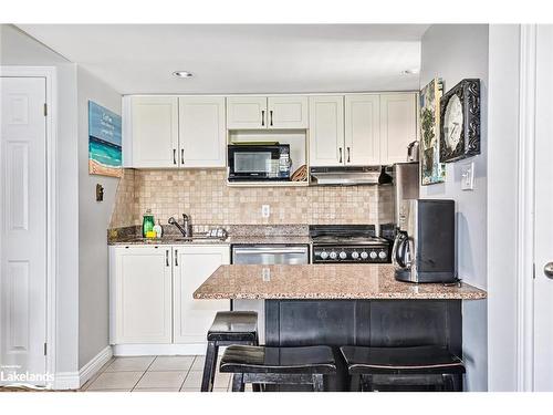 605-796468 19 Grey Road, The Blue Mountains, ON - Indoor Photo Showing Kitchen With Upgraded Kitchen