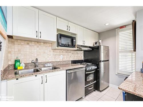 605-796468 19 Grey Road, The Blue Mountains, ON - Indoor Photo Showing Kitchen With Stainless Steel Kitchen With Double Sink