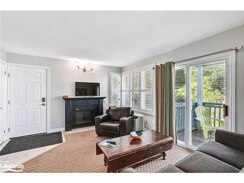 605-796468 19 Grey Road, The Blue Mountains, ON - Indoor Photo Showing Living Room