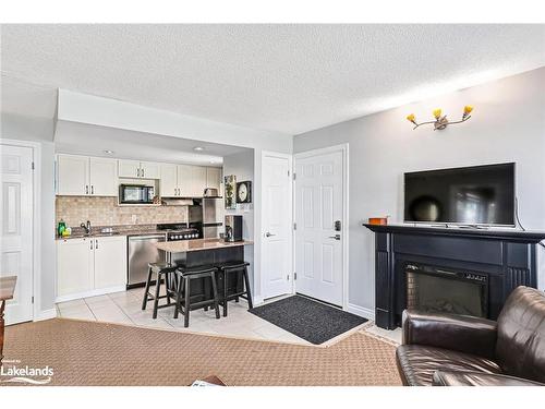 605-796468 19 Grey Road, The Blue Mountains, ON - Indoor With Fireplace