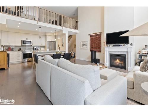 22 Emerson Mews, Collingwood, ON - Indoor Photo Showing Living Room With Fireplace