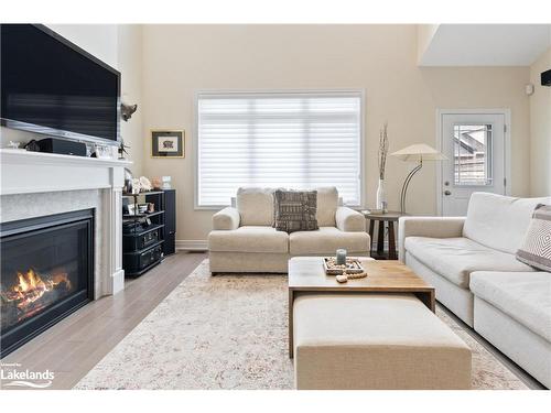 22 Emerson Mews, Collingwood, ON - Indoor Photo Showing Living Room With Fireplace