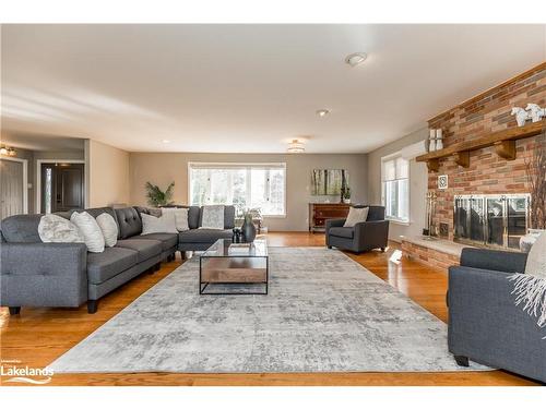 828350 32 Side Road Glencairn Townline, Mulmur, ON - Indoor Photo Showing Living Room With Fireplace