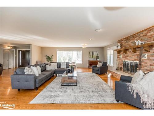 828350 32 Side Road Glencairn Townline, Mulmur, ON - Indoor Photo Showing Living Room With Fireplace