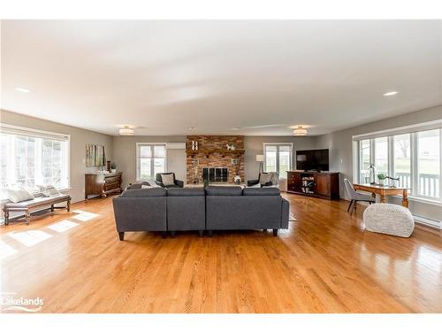 828350 32 Side Road Glencairn Townline, Mulmur, ON - Indoor Photo Showing Living Room With Fireplace