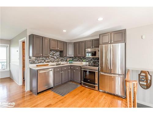 828350 32 Side Road Glencairn Townline, Mulmur, ON - Indoor Photo Showing Kitchen With Double Sink With Upgraded Kitchen