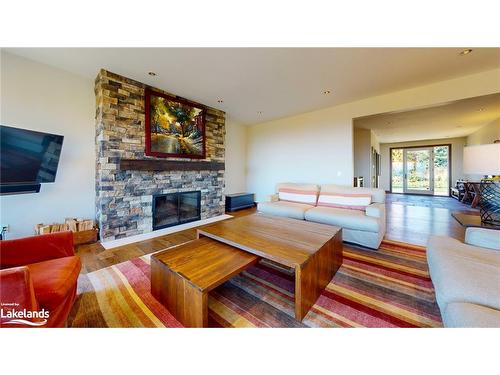 589370 Grey 19 Road, The Blue Mountains, ON - Indoor Photo Showing Living Room With Fireplace