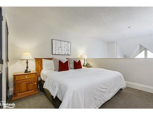 202-796404 19 Grey Road, The Blue Mountains, ON - Indoor Photo Showing Bedroom