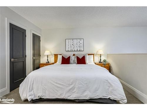 202-796404 19 Grey Road, The Blue Mountains, ON - Indoor Photo Showing Bedroom