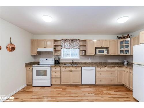 140 Wolfe Trail, Tiny, ON - Indoor Photo Showing Kitchen With Double Sink