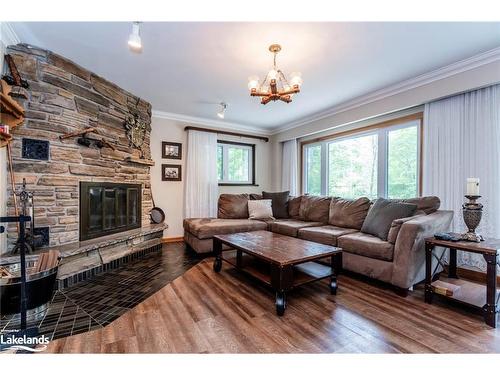 9 Bourgeois Court, Tiny, ON - Indoor Photo Showing Living Room With Fireplace