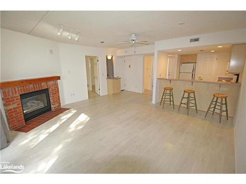 153-53 Trott Boulevard, Collingwood, ON - Indoor Photo Showing Living Room With Fireplace