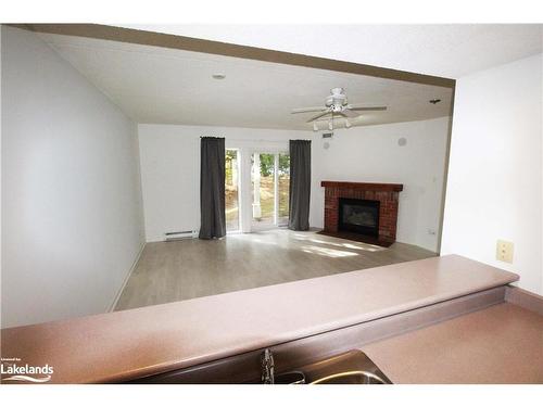 153-53 Trott Boulevard, Collingwood, ON - Indoor Photo Showing Living Room With Fireplace