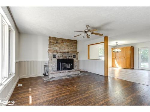 260 12 Concession E, Tiny Twp, ON - Indoor Photo Showing Living Room With Fireplace