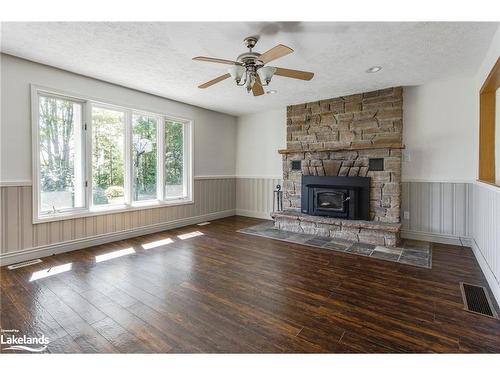 260 12 Concession E, Tiny Twp, ON - Indoor Photo Showing Living Room With Fireplace