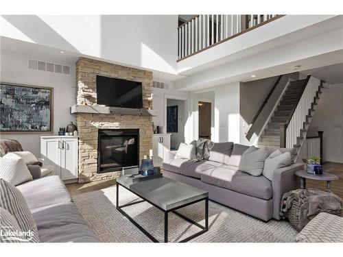 22-1094 Mortimers Point Road, Port Carling, ON - Indoor Photo Showing Living Room With Fireplace