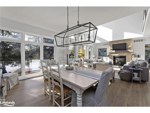 22-1094 Mortimers Point Road, Port Carling, ON - Indoor Photo Showing Dining Room With Fireplace