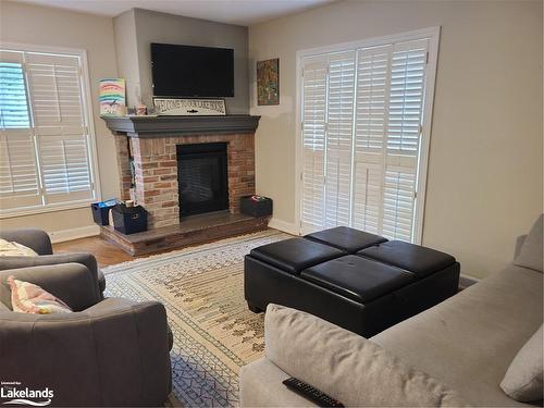 384 Mariners Way, Collingwood, ON - Indoor Photo Showing Living Room With Fireplace