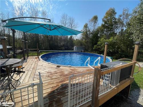 2066 Irish Line, Coldwater, ON - Outdoor With Above Ground Pool With Deck Patio Veranda With Backyard