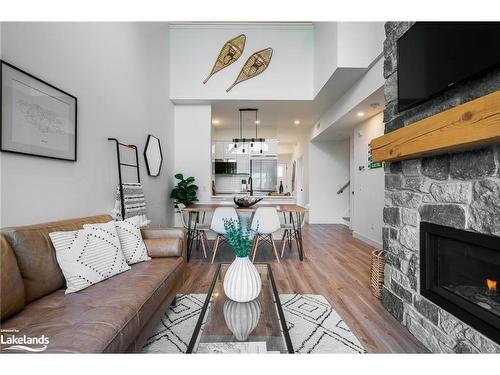 406-16 Beckwith Lane, The Blue Mountains, ON - Indoor Photo Showing Living Room With Fireplace