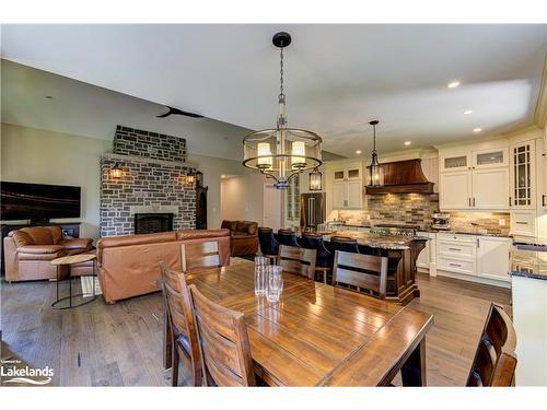 833 Eastdale Drive, Wasaga Beach, ON - Indoor Photo Showing Dining Room With Fireplace