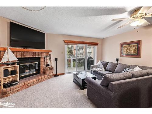 61-22 Ramblings Way, Collingwood, ON - Indoor Photo Showing Living Room With Fireplace