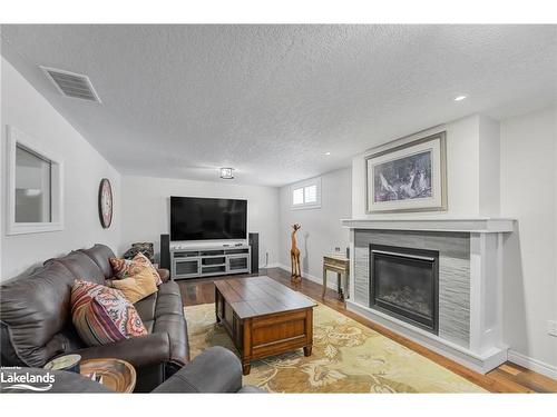 814 Jane Boulevard, Midland, ON - Indoor Photo Showing Living Room With Fireplace