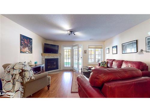 71 Greenway Drive, Wasaga Beach, ON - Indoor Photo Showing Living Room With Fireplace