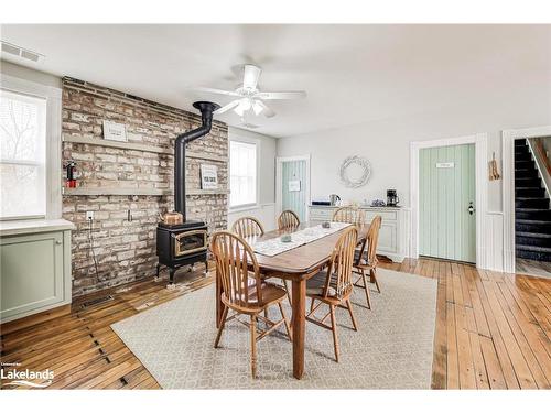 726004 22B Side Road, Grey Highlands, ON - Indoor Photo Showing Dining Room With Fireplace