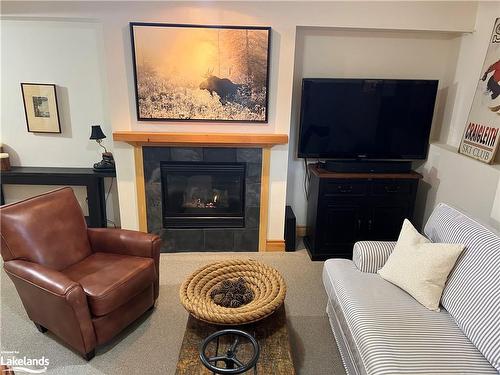 57-204 Blueski George Crescent, The Blue Mountains, ON - Indoor Photo Showing Living Room With Fireplace