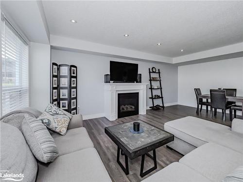 22 Quinn Forest Drive, Bracebridge, ON - Indoor Photo Showing Living Room With Fireplace