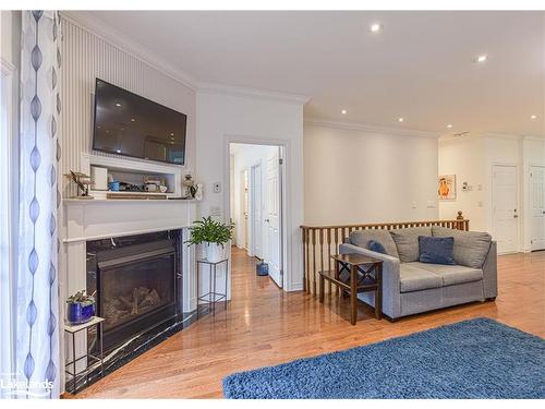 3305 Summerhill Way, Severn, ON - Indoor Photo Showing Living Room With Fireplace