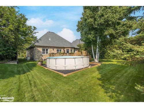 75 Edward Street E, Creemore, ON - Outdoor With Above Ground Pool With Backyard