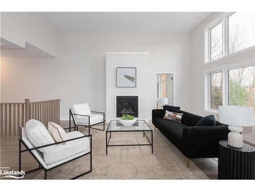 1009 Boyne Ridge Court, Lake Of Bays, ON - Indoor Photo Showing Living Room With Fireplace