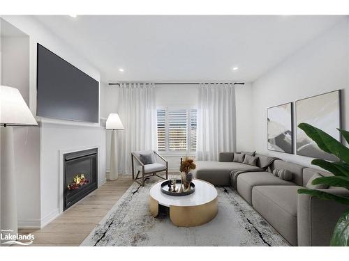 96 Mclean Avenue, Collingwood, ON - Indoor Photo Showing Living Room With Fireplace