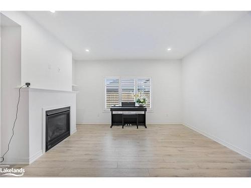 96 Mclean Avenue, Collingwood, ON - Indoor Photo Showing Living Room With Fireplace