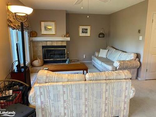 349 Mariners Way, Collingwood, ON - Indoor Photo Showing Living Room With Fireplace