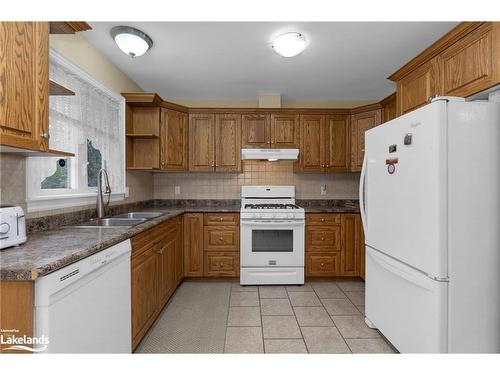 96 46Th Street N, Wasaga Beach, ON - Indoor Photo Showing Kitchen With Double Sink