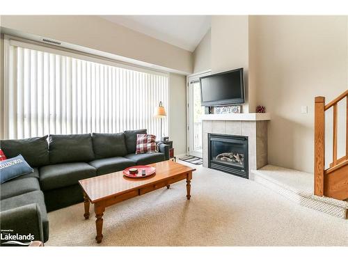 938 Cedar Pointe Court, Collingwood, ON - Indoor Photo Showing Living Room With Fireplace