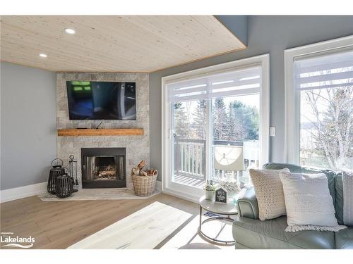 4 Turner Drive, Huntsville, ON - Indoor Photo Showing Living Room With Fireplace