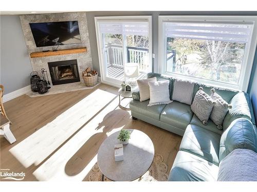 4 Turner Drive, Huntsville, ON - Indoor Photo Showing Living Room With Fireplace