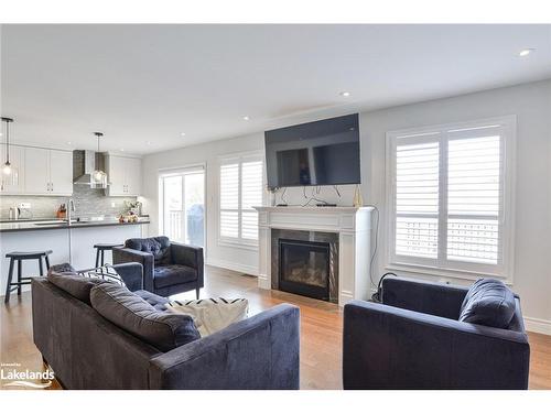 83 Douglas Drive, Bracebridge, ON - Indoor Photo Showing Living Room With Fireplace