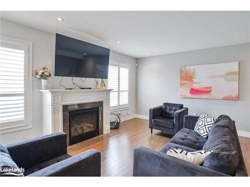 83 Douglas Drive, Bracebridge, ON - Indoor Photo Showing Living Room With Fireplace