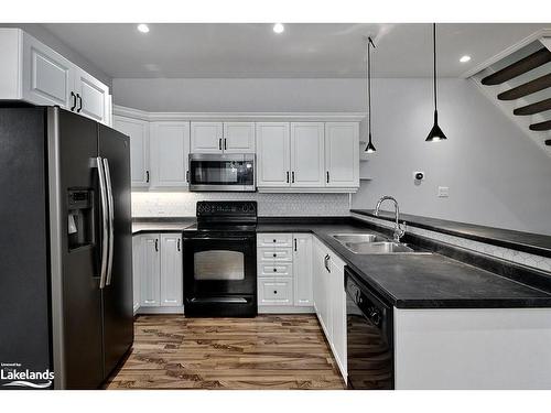 12-24 Albery Court, Meaford, ON - Indoor Photo Showing Kitchen With Double Sink