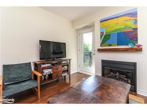 308-6 Brandy Lane Drive, Collingwood, ON - Indoor Photo Showing Living Room With Fireplace