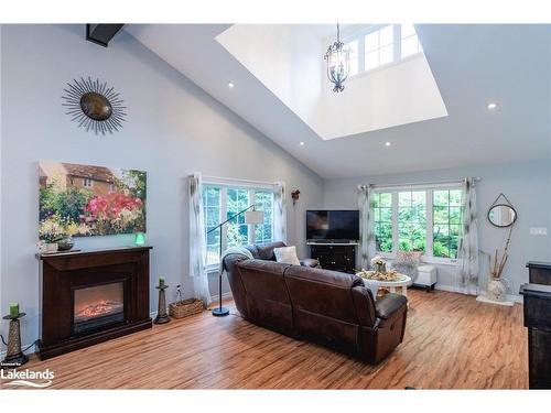 1240 Methodist Point Road, Tiny, ON - Indoor Photo Showing Living Room With Fireplace