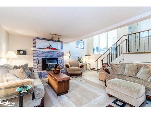 671 Algonquin Drive, Midland, ON - Indoor Photo Showing Living Room With Fireplace