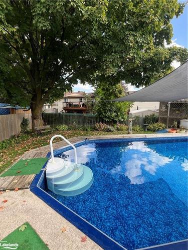 671 Algonquin Drive, Midland, ON - Outdoor With In Ground Pool With Backyard