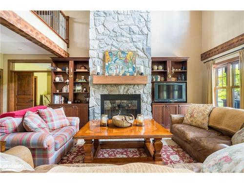 148 Snowbridge Way, The Blue Mountains, ON - Indoor Photo Showing Living Room With Fireplace