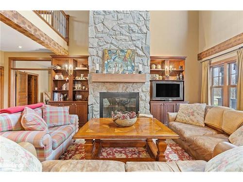 148 Snowbridge Way, The Blue Mountains, ON - Indoor Photo Showing Living Room With Fireplace